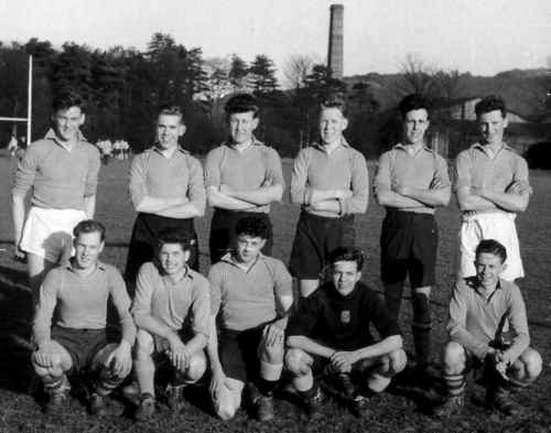 Football team posing for camera.