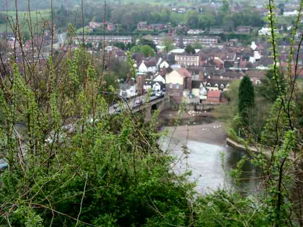 Bridgenorth through the trees. Distant view of a town.