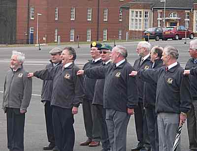 Right dress - a group of seventy year olds on a parade ground doing a right dress